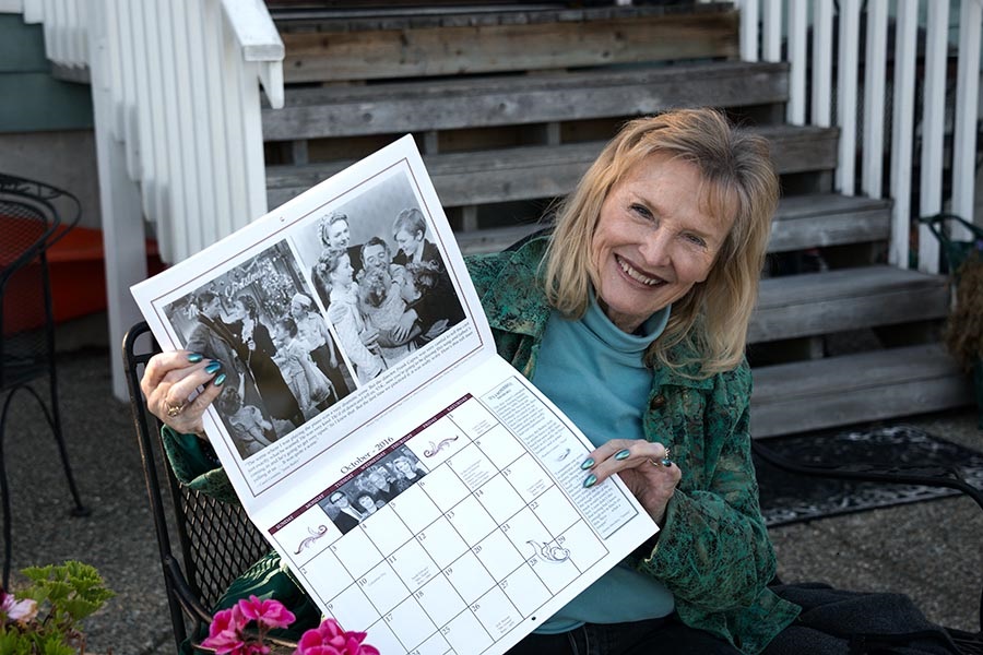 Karolyn “Zuzu” Grimes displays different pages from the calendar.
October 2016